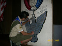 The traditional signing of the Eagle Board